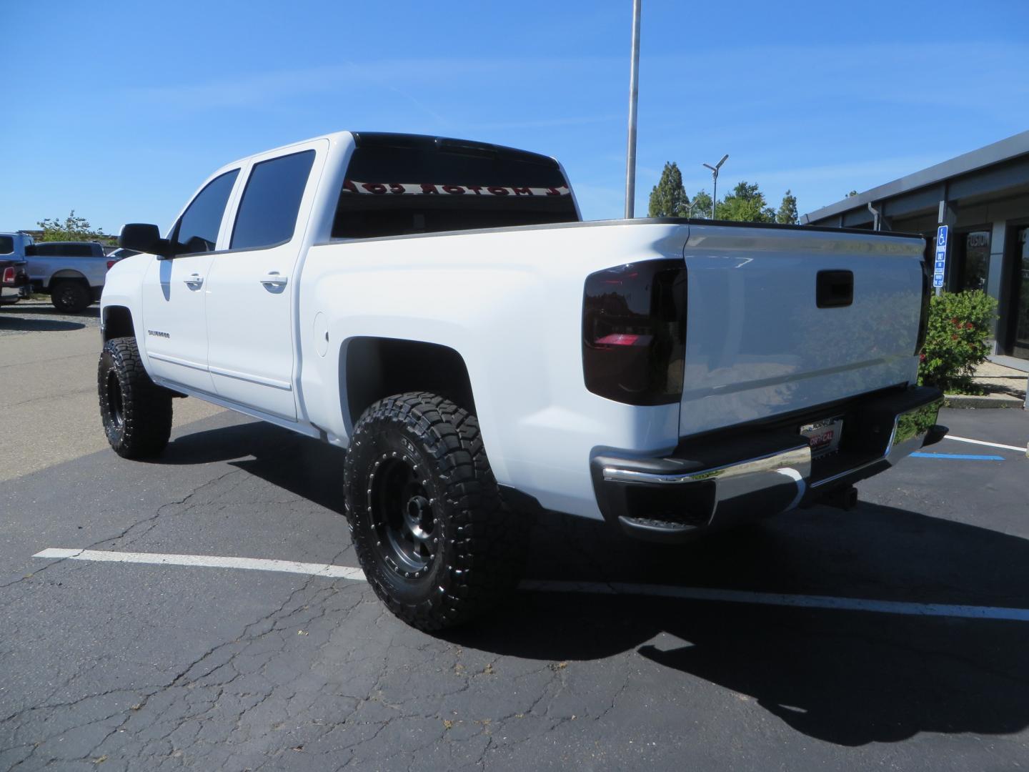 2018 White /BLACK Chevrolet Silverado 1500 LT (3GCPCREC7JG) with an 5.3L V8 OHV 16V engine, automatic transmission, located at 2630 Grass Valley Highway, Auburn, CA, 95603, (530) 508-5100, 38.937893, -121.095482 - Must see Pre Runner.... CST front lift spindals, Camburg UCA's, King Adjustable 2.5 Coil-overs, King 2.5 rear shocks, 35" Toyo RT Trail tires, 17" Method Race wheels, MZ front skid plate, G2 rear differntail cover, Full size bed mounted spare tire, Black Vinyl roof wrap, smoke tail lights and 3rd br - Photo#6